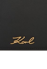 KARL LAGERFELD POUCH SIGNATURE  - Taška s příčným popruhem - black gold