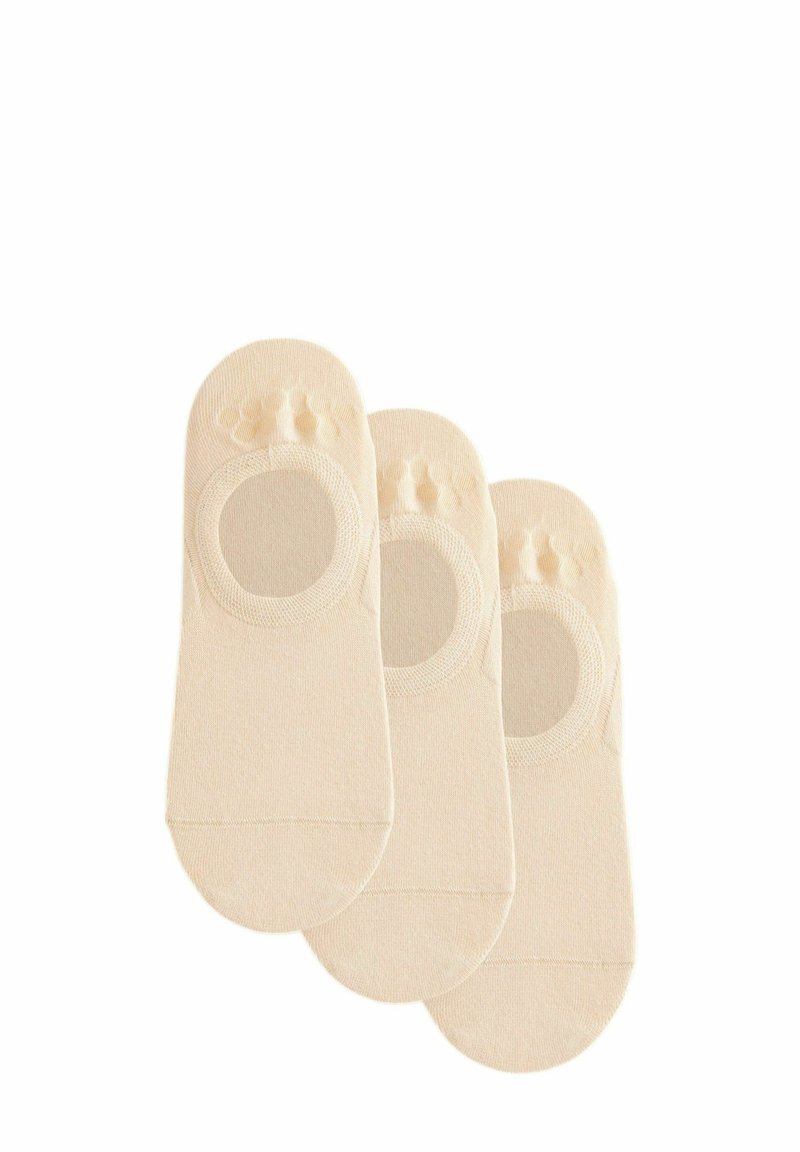 Bež čarape niskog kroja od mekog materijala. Imaju kružni izrez na vrhu i textured grip točke na peti za stabilnost.