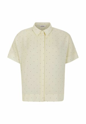 Kurzärmlige gelbe Bluse mit durchgehender Knopfleiste, die mit kleinen schwarzen Punkten und einem klassischen Kragen versehen ist. Hergestellt aus leichtem Stoff.