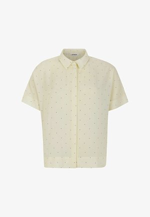 Short-sleeved yellow blouse with a button-up front, featuring small black dots and a classic collar. Made of lightweight fabric.