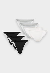 Sæt med tre dameunderbukser med blondekant i sort, grå og hvid, arrangeret i rækker på en ensfarvet hvid baggrund.