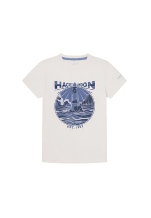 T-shirt en coton blanc avec un graphique circulaire bleu marine d'un phare au-dessus des vagues, accompagné du texte "HACKETT LONDON" et "EST. 1983".