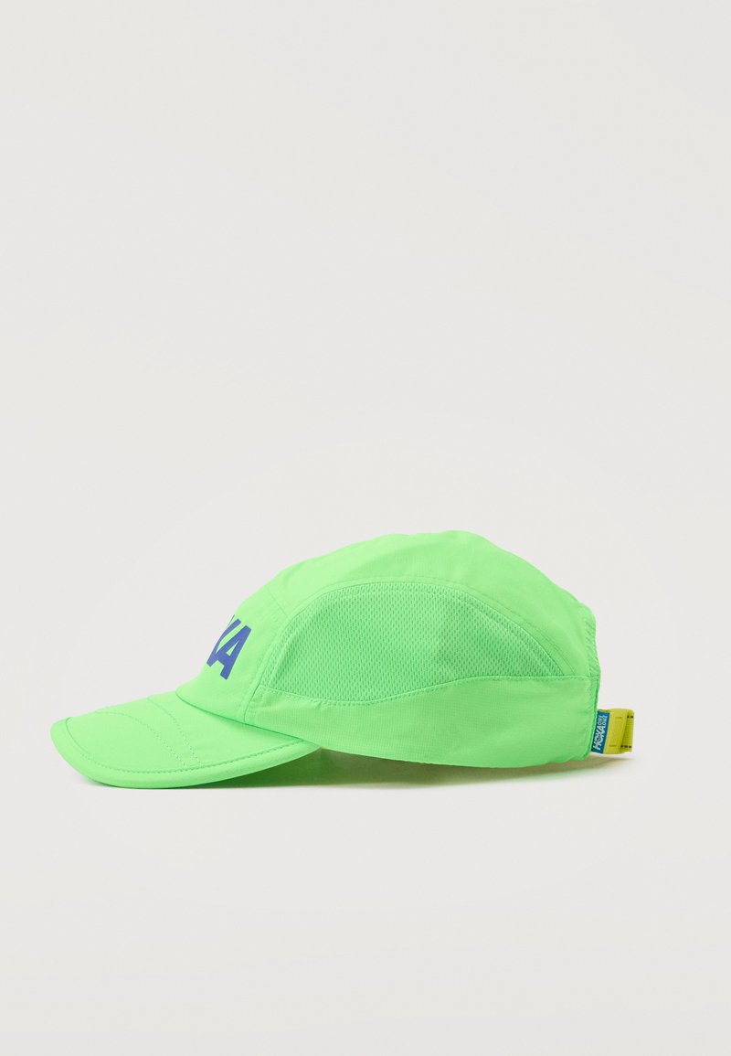 Neon green baseball cap with mesh side panels, blue lettering on front, and yellow adjustable strap with blue tag at the back.