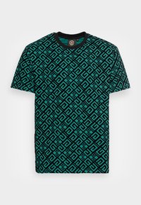 T-shirt in cotone turchese con motivo geometrico nero. Caratterizzata da un colletto rotondo nero e maniche corte. Adatta per un look casual.