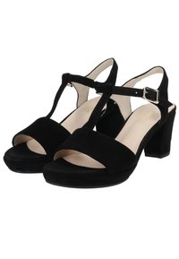 Černé semišové T-páskové sandály s otevřenou špičkou a silným podpatkem. Obsahují přezku pro zapínání a měkkou podšívku pro pohodlí.
