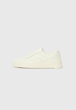 Sneakers in light cream leather with a textured finish, rounded toe, rubber sole, and minimalistic design. Features subtle logo on heel.