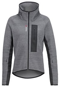 Giacca grigia con zip e colletto alto, realizzata in tessuto testurizzato. Presenta accenti neri, una tasca verticale con zip e un retro leggermente allungato.