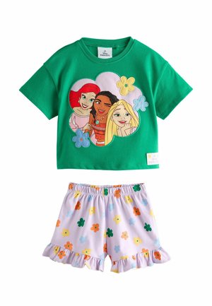 Zelený top s krátkym rukávom s potlačou Disney princezien a biele šortky s farebným kvetinovým vzorom a volánikovým lemom.