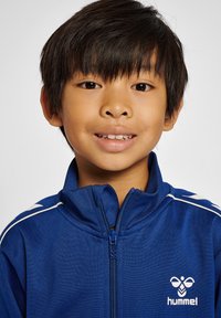 Hummel UNISEX SET granatowy