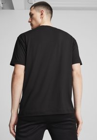 Puma MERCEDES-AMG PETRONAS F1® CLOUDSPUN  - T-shirts print - black