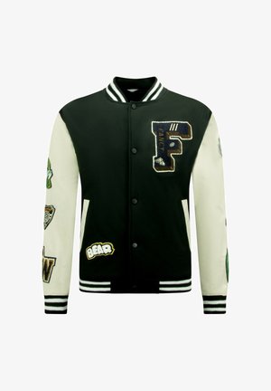 Zwart-witte varsityjas met geborduurde patches, gestreepte kraag en manchetten, drukknoopsluiting aan de voorkant en zakken aan beide zijden.