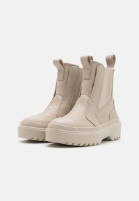 Converse CHUCK TAYLOR ALL STAR LUGGED CHELSEA BOOT UNISEX - Klasszikus bokacsizmák - papyrus