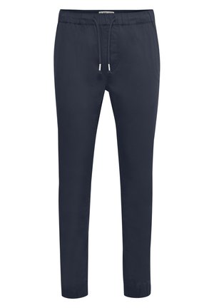 Mørkeblå, lette bukser med snøre i taljen og elastiske manchetter. Glat tekstur, slim fit-design og minimal detaljert.