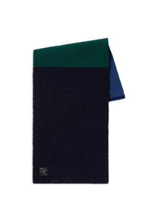 Écharpe tricotée en bleu marine avec une texture côtelée. Comprend des accents verts et bleus en haut. Étiquette attachée au coin inférieur.