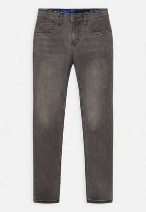 Dopasowane jeansy z ciemnoszarego denimu z pięcioma kieszeniami i zapięciem na guzik w pasie, wewnątrz z metką Levi's.