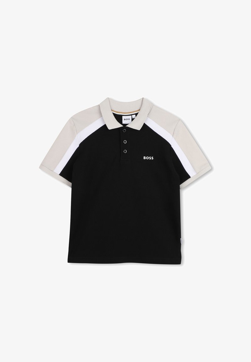 Polo noir avec épaules beiges, rayures diagonales blanches, trois boutons et un petit logo "BOSS" à l'avant.