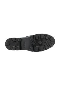 Suela de zapato negra con patrones de relieve profundos y la marca "JOOP!" grabada en el centro.