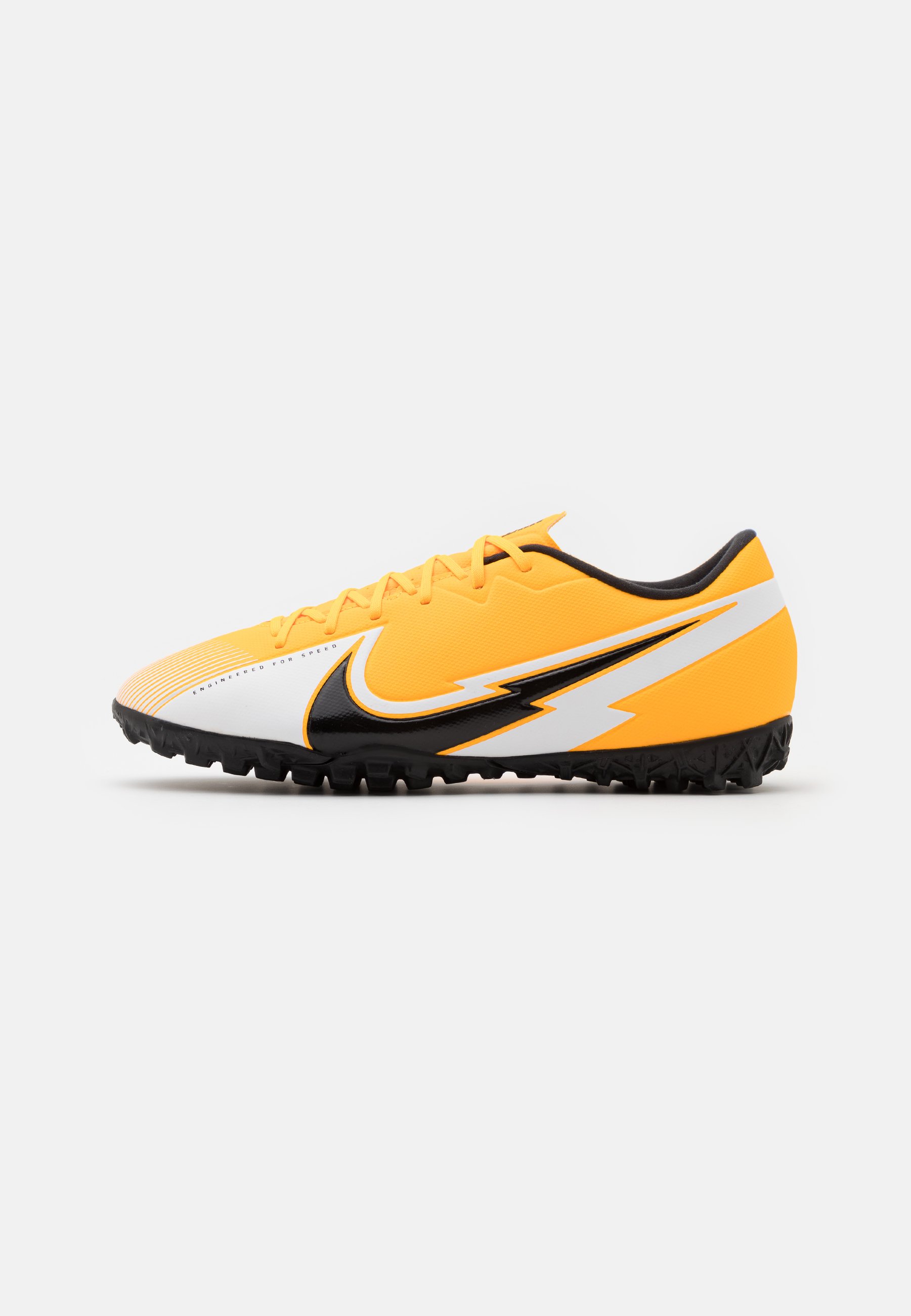 yellow nike astro turf