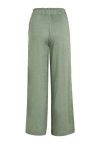 Pantalon large vert clair, ample, avec taille élastique froncée, vu de dos sur fond blanc.