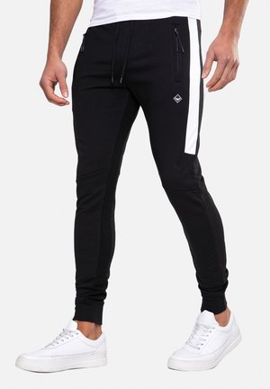 DWAYNE - Pantalones deportivos - black