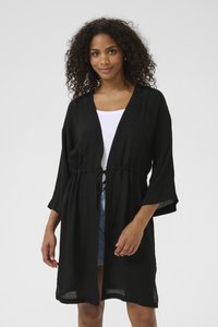 Svart, långärmad kimono med lös passform och cinchad midja. Lättviktsmaterial med en något texturerad yta, med öppen front.