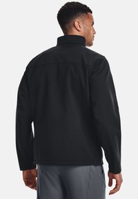 Under Armour SHIELD JACKET - Veste softshell - black