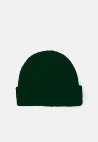 Tume roheline kootud beanie müts tekstuuriga pinnaga ja kokkuvolditava äärisega. Ümar ülaosa koos mugava istuvusega, mõeldud soojuse ja mugavuse tagamiseks.