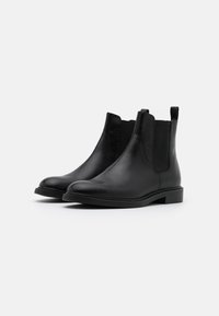 Vagabond AMINA - Botas clássicas de cano curto - black