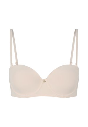 Beige toppat bralette med mjukt tyg, bygelstöd, justerbara band och en liten dekorativ detalj i mitten.