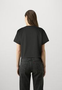 Guess Jeans - T-shirt z nadrukiem