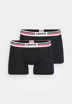 Mustad puuvillased bokserid musta värvi, millel on valge elastsuus, millel on punased ja sinised triibud ning ees punane Levi'si logo silt.