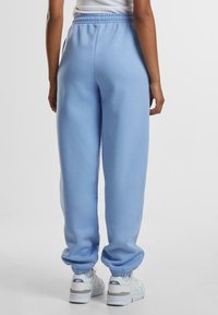 Urban Classics FLUFFY - Joggebukse - powderblue