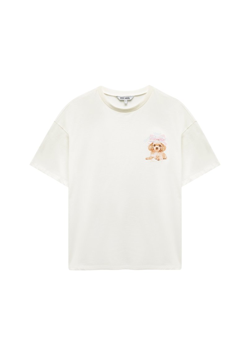 Lys cremefarvet kortærmet T-shirt lavet af blød bomuld, med et trykt brunt hundemotiv med en pink sløjfe på venstre brystområde.
