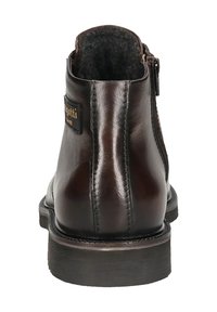 Braune Leder-Ankle-Boots mit glatter Oberfläche, seitlichem Reißverschluss, strukturiertem Innenfutter und gestapelter Gummisohle. Logo auf der Rückseite sichtbar.