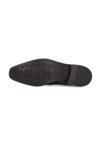Suela de zapato de goma negra con un patrón texturizado que presenta formas rectangulares y circulares para mayor agarre, con una parte trasera más estrecha y una delantera más ancha.