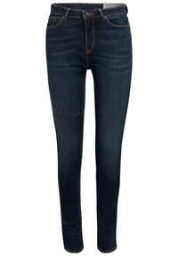 Jean skinny bleu foncé avec cinq poches, couture orange, fermeture avant par bouton et zip.