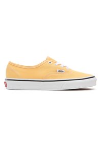 Baskets en toile jaune avec lacets blancs et semelle en caoutchouc. Présente une bande latérale noire et un logo Vans sur le côté. Design bas, arrondi.