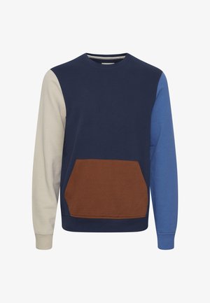 Felpa blu navy con maniche color-block in crema, blu e marrone. Presenta una tasca frontale e collo e polsini a costine. Materiale in cotone.