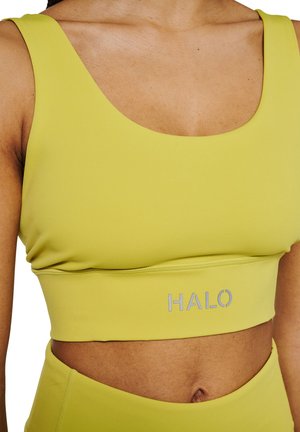 Limegrüner Sport-BH mit weitem Rundhalsausschnitt, geripptem Saum und silbernem "HALO"-Logo in der Mitte. Hergestellt aus glattem, elastischem Material.