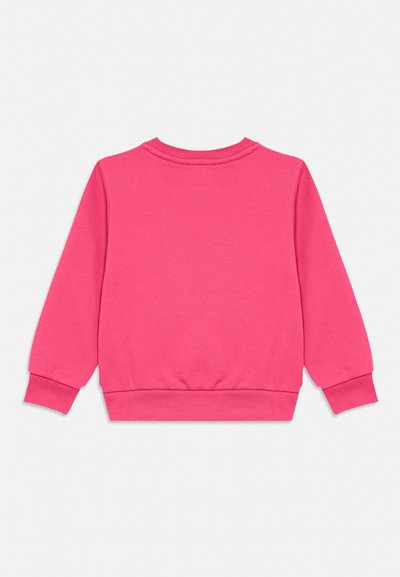 Hele roosa pikkade varrukatega dressipluus soonikkoes mansettide, ääre ja ümara kaelusega, näidatud tagant vaadatuna ühevärvsel taustal.