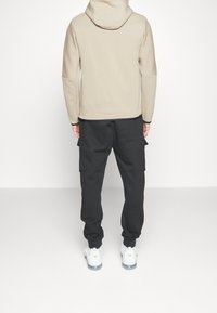 Nike Sportswear Cargobyxor - black