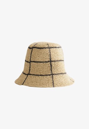 Chapeau bob tissé beige avec large bord et lignes de motif en grille noire sur toute la surface.