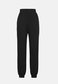Pantalon jogger noir avec ceinture et chevilles élastiques, coupe décontractée et poches latérales, présenté sur un fond clair uni.