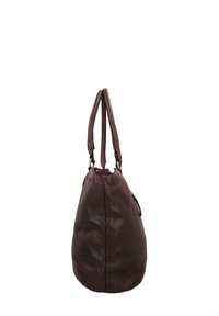 Sac à main en cuir marron foncé vu de côté avec deux longues bretelles sur fond blanc.