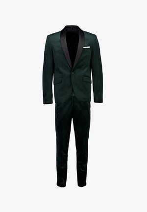 Groen fluwelen kostuum met een zwarte satijnen sjaalkraag, slim fit ontwerp, twee voorkennis en een enkele knoopsluiting. Bevat een witte pochet.