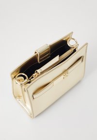 Tommy Hilfiger HERITAGE MINI SATCHEL - Torbica - gold-coloured
