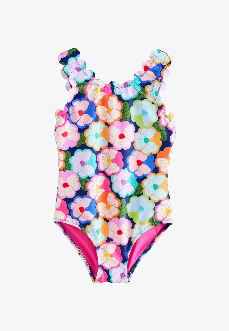 Maillot de bain une pièce pour enfant avec de grands motifs floraux colorés et des bretelles festonnées sur un fond bleu marine.