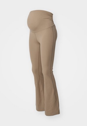 Pantalons de yoga évasés pour maternité en beige, dotés d'une ceinture élastique froncée et d'un tissu doux, conçus pour le confort et la liberté de mouvement.
