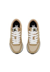Beige sneakers with white laces, suede and mesh material, rounded toe, textured surface, and black sole. Star logo on the tongue.