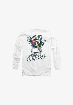 Weißes Langarmshirt mit einem grafischen Design, das Blumen und den Text "Beste Mama im Imperium" in grüner und schwarzer Typografie zeigt.